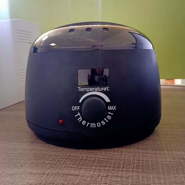 Double pot wax heater